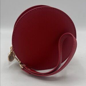 Round Bobbie Brown wristlet NWOT .